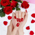Kyco Nails Red Scarlet semi-cured gel nail wraps with a glossy finish, shown on hands with red roses and petals.