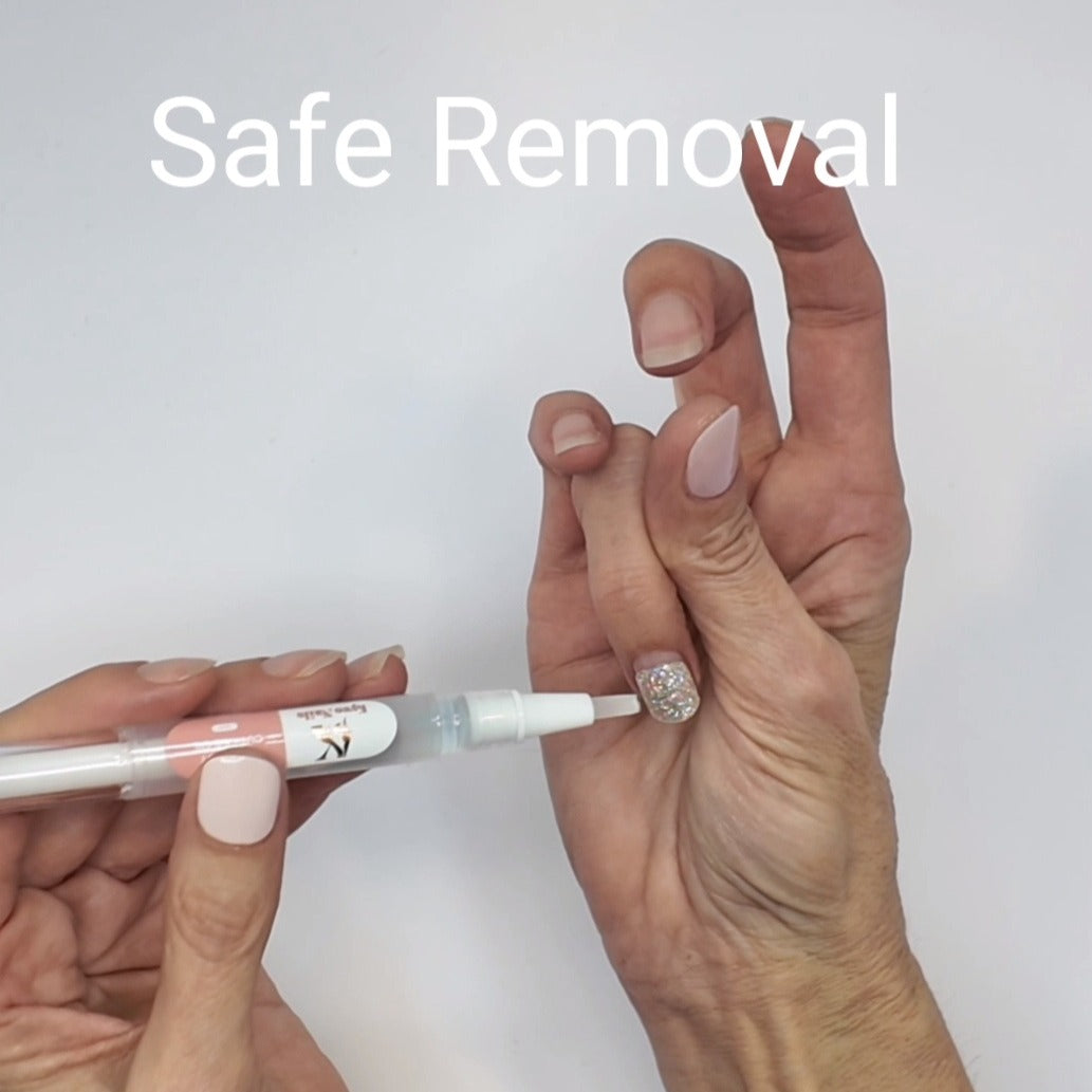 Removing semi-cured gel nail wraps using cuticle oil to gently lift product without damaging the natural nail